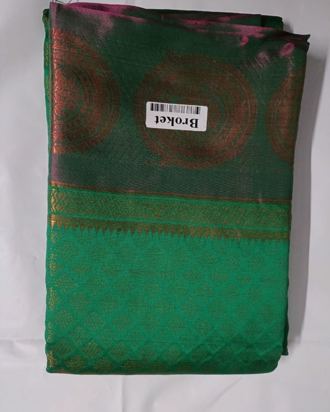 Emerald Green Brocade Silk Saree with Antique Copper Zari Border